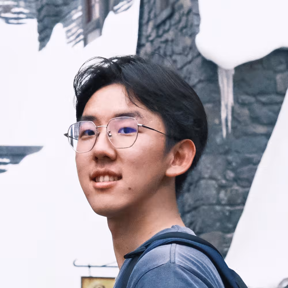 I am Shihefeng. I am wearing a blue shirt.